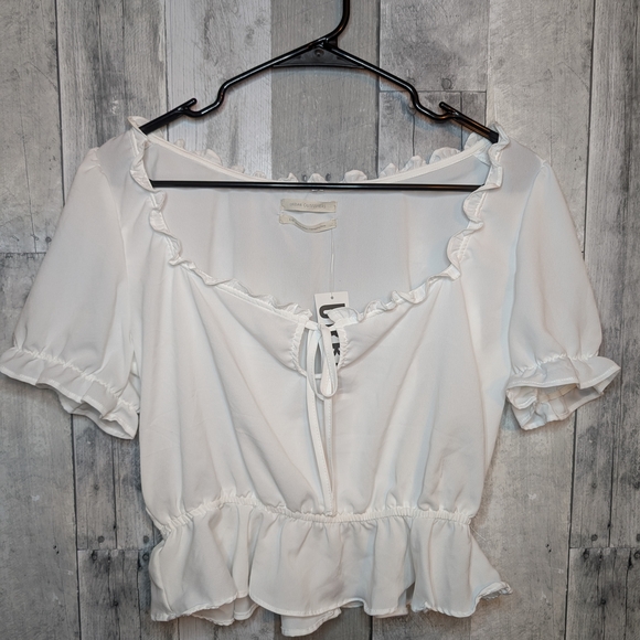 Urban Outfitters Tops - Urban Outfitters White Puff Sleeve Peplum Blouse